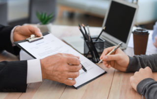 preparing to sign a document